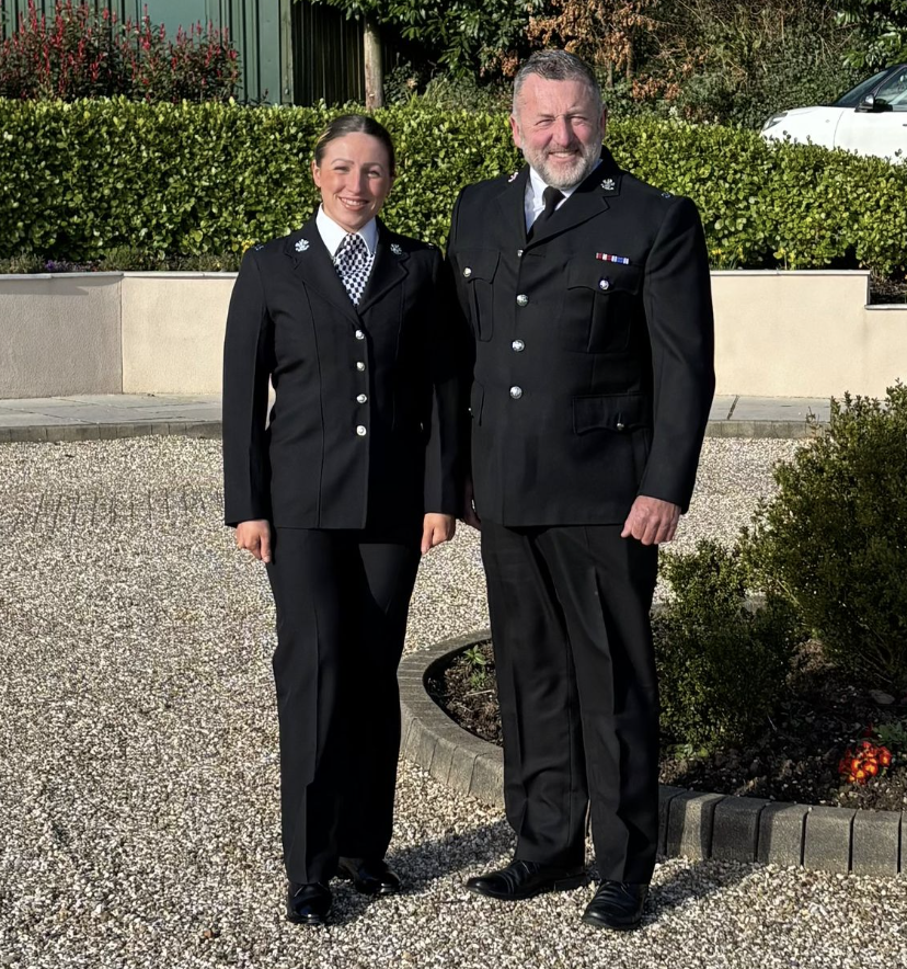Retiring South Wales police officer Steve Parsons with daughter Tayla both in their full police uniforms